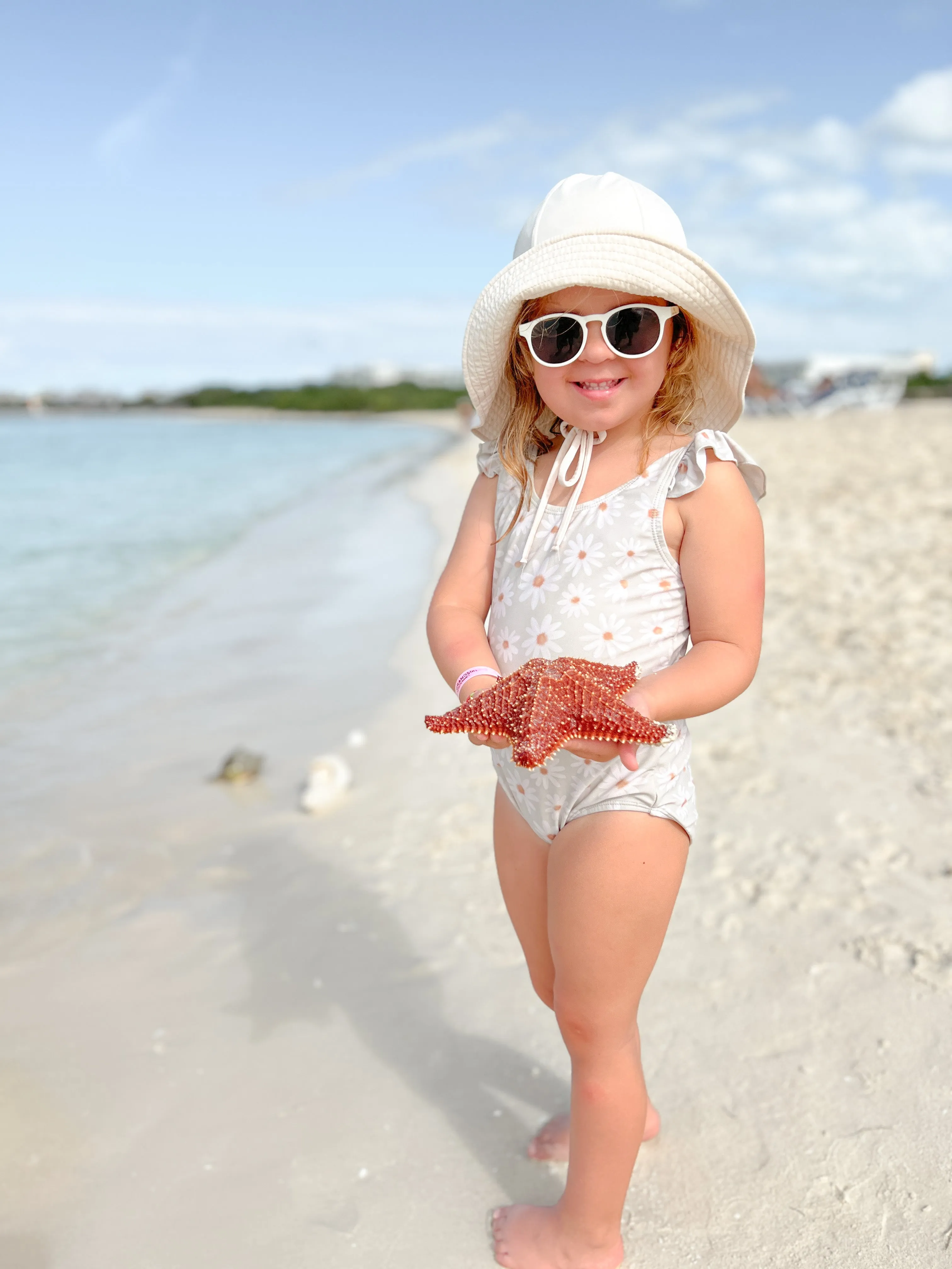 floppy hat | swim | cream