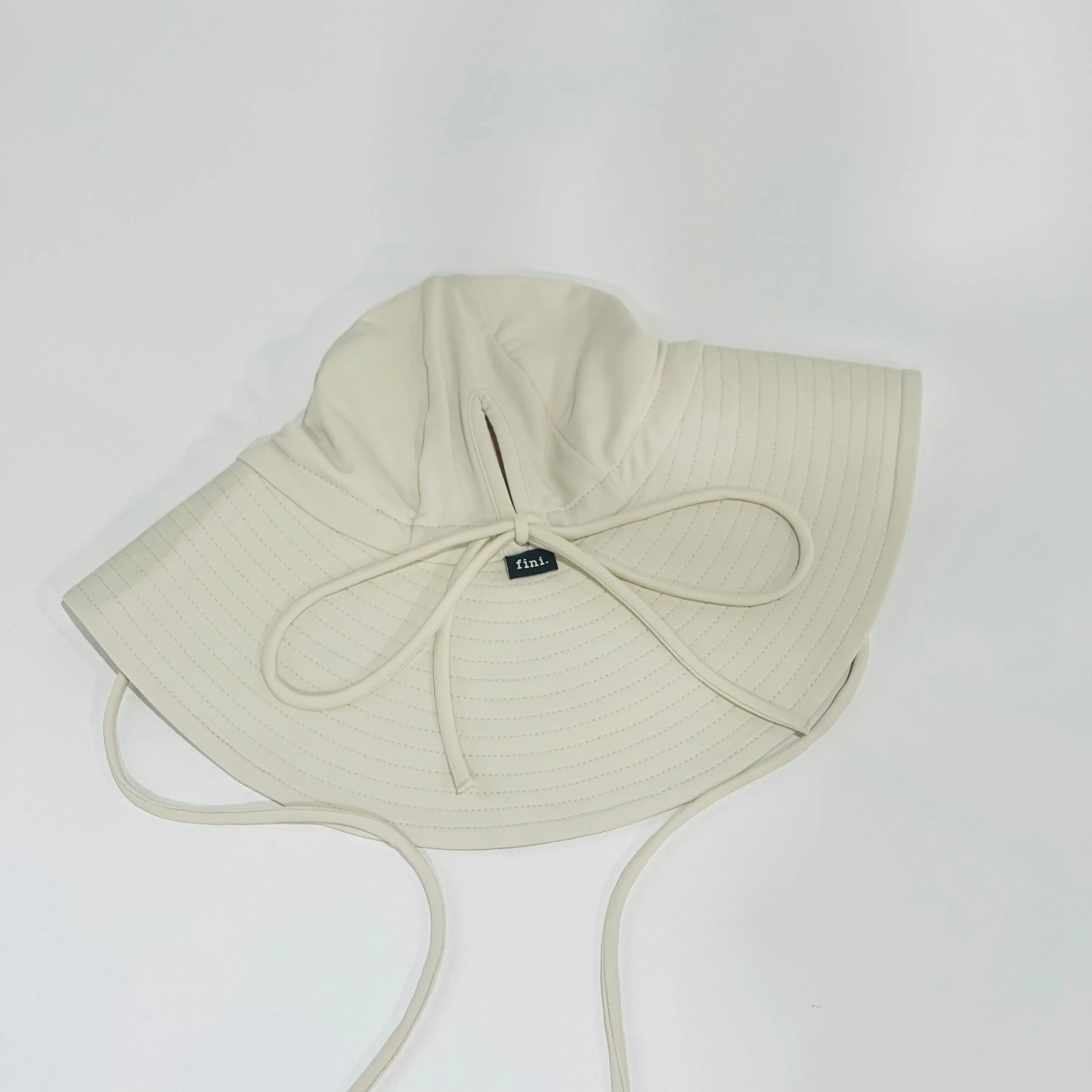 floppy hat | swim | cream