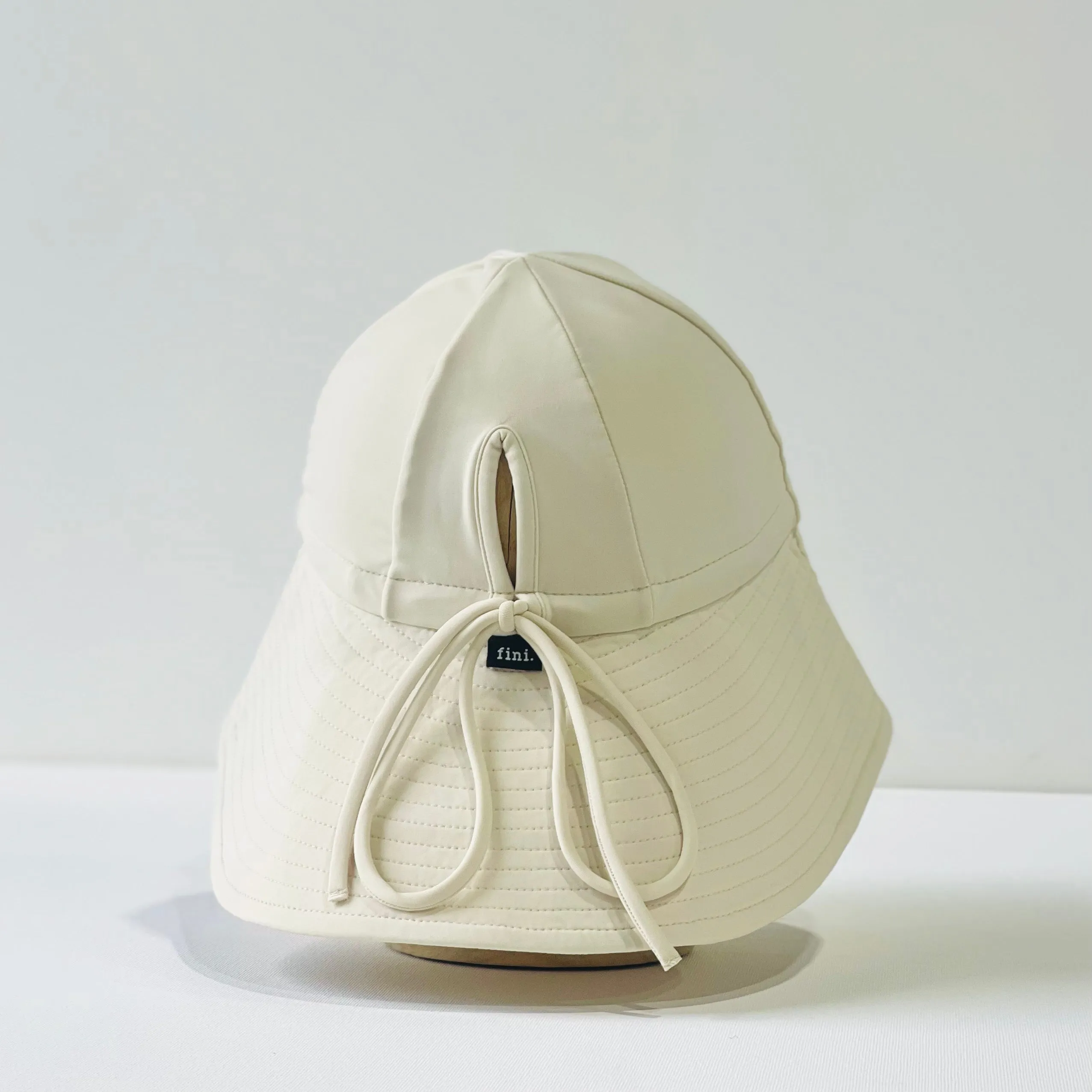 floppy hat | swim | cream